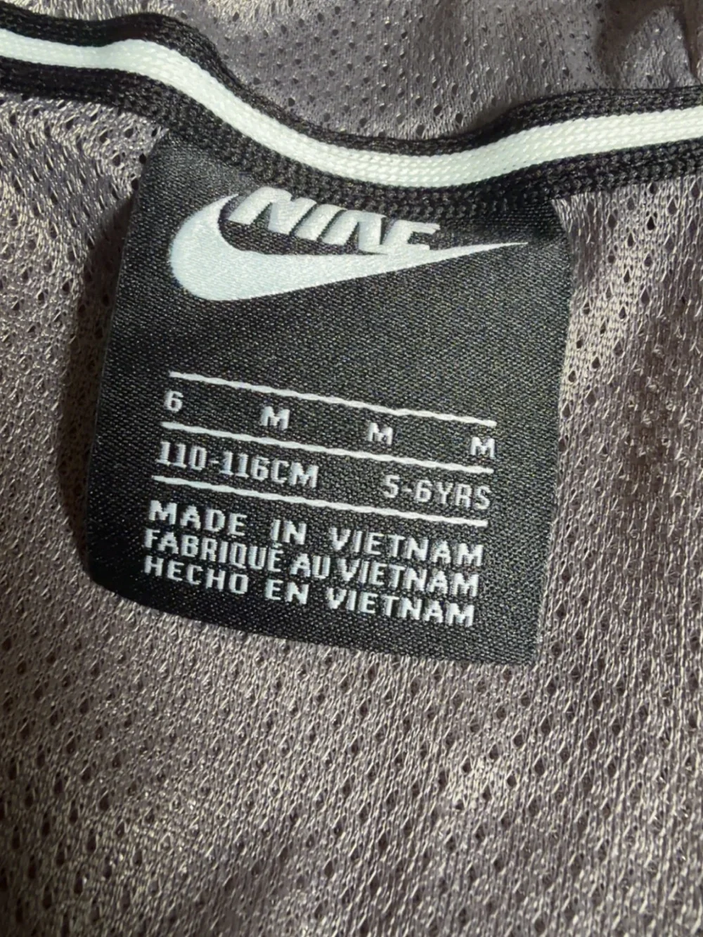 Nike Kids Gray Hooded Windbreaker with White Logo